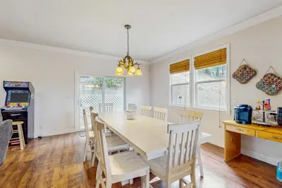 a dining room with a table and chairs at Walk to Lake Arrowhead! Family Home with Games in Lake Arrowhead