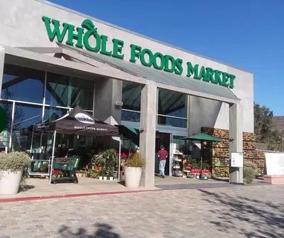 a store front of a whole foods market at Oceanfront, Pool, Jacuzzi NO HWY Noise! in Malibu Beach