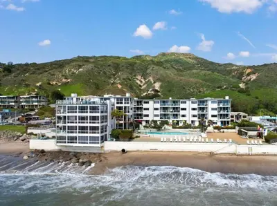 an aerial view of a hotel on the beach at Oceanfront, Pool, Jacuzzi NO HWY Noise! in Malibu Beach