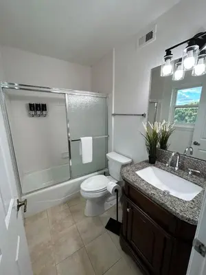 a bathroom with a toilet and a sink and a shower at CA1 Fun And Central Home with Sauna in La Palma