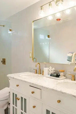 a bathroom with a sink and a mirror at Amazing location, Unique Oceanfront Beach House! in Manhattan Beach