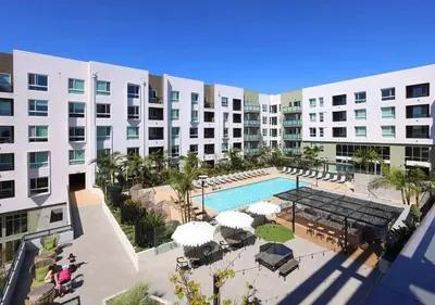 an aerial view of a resort with a swimming pool at Premium Stay 10 Min From Disneyland With Pool & GYM in Santa Ana
