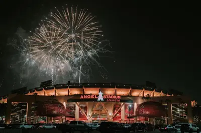 a fireworks display over a baseball stadium with a field at Stunning Haven with Pool Gym Parking Close to Disneyland in Santa Ana
