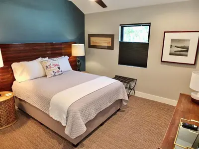 a bedroom with a large bed and a window at Naples Luxury Retreat - 2 BDR Walk to Beach Dining & Shops in Long Beach