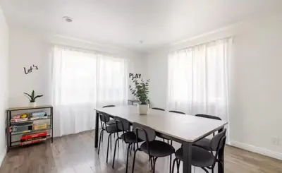 a dining room with a table and chairs at CA5 House Cozy 3BR in Azusa in Azusa
