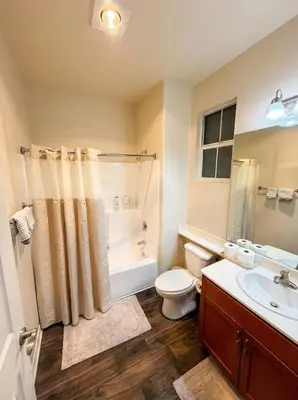 a bathroom with a toilet and a shower and a sink at Marina Del Rey View 1BA & 2BA in MDR - Pool, Jacuzzi, Gym in Los Angeles