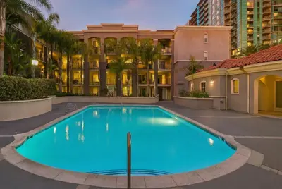 a swimming pool in front of a building at Marina Del Rey View 1BA & 2BA in MDR - Pool, Jacuzzi, Gym in Los Angeles
