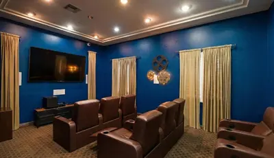 a waiting room with chairs and a flat screen tv at Marina del Rey 1BA & 2BA Getaway - Pool - Spa - Gym in Los Angeles