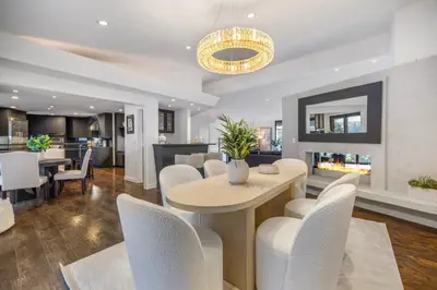 a dining room and living room with a table and chairs at Shirley Lane in Los Angeles