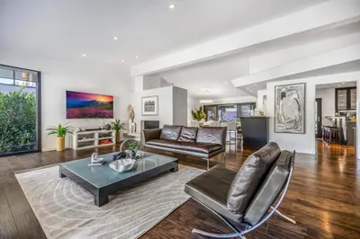 a living room with a couch and a table at Shirley Lane in Los Angeles