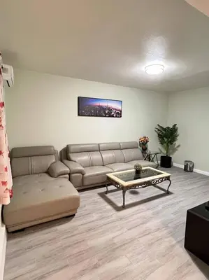a living room with a couch and a coffee table at Hacienda New Remodeled 17miles-Disney in Hacienda Heights
