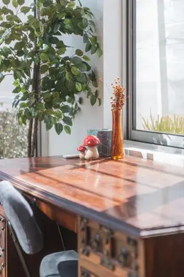 a wooden table with a vase on top of it at Industrial&Stylish 3 bedroom 3 bathrooms Home With Views and Hot tub in Los Angeles