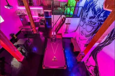 an overhead view of a room with pink lights at Arts District DTLA-Artist Loft With Free Parking and Pooltable in Los Angeles