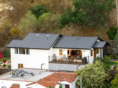 an aerial view of a white house with a black roof at Hidden Oasis 3 bedroom 2 bathroom Home With large backyard and Views Near DTLA in Los Angeles