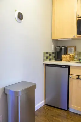 a small kitchen with a counter and a dishwasher at Charming and Cozy 1 Bedroom 1 Bathroom Guest Suite in Silverlake in Los Angeles