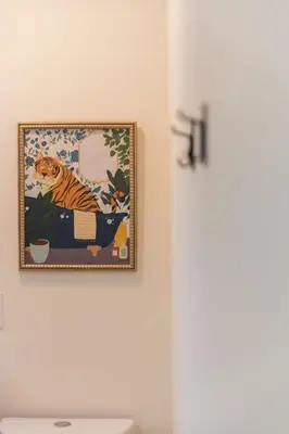 a picture of a cat in a bath tub on a wall at Renovated 1 Bedroom 1 bathroom Cottage Near Larchmont Village in Los Angeles