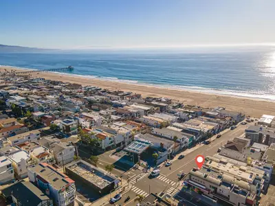 an aerial view of a beach and the ocean at Ocean View condo in the heart of Manhattan Beach in Manhattan Beach