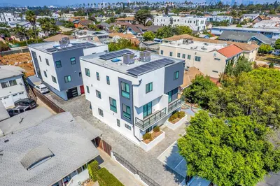 an overhead view of a large white building in a city at Spacious 4BR LA Getaway with Parking and Fast Wi-Fi in Los Angeles