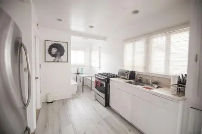 a kitchen with a sink and a stove top oven at Cozy room in East Holywood, 7 min from holllywood, 15 from downtown, 20 to hollywood sing in Los Angeles