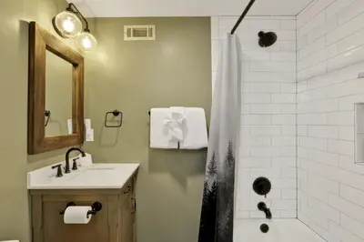 a bathroom with a sink and a shower at Arlberg Village Haus Game Room Walk to the Slopes in Big Bear Lake