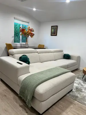 a living room with a couch and a table at Hanna's Corner in Canoga Park