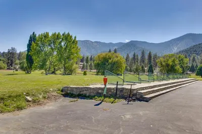 a group of steps with a fire hydrant in a park at Golf and Swim! Pine Mtn Club Retreat with Game Area in Pine Mountain Club