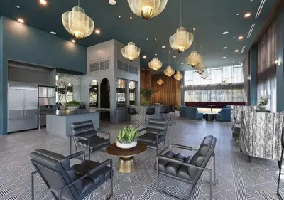 a lobby with chairs and a bar in a building at Bright & Cozy Getaway with Pool Free Parking 10 mins Disneyland in Santa Ana
