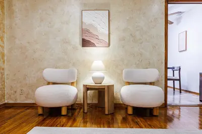 three chairs and a table with a lamp in a room at Santa Monica 2BD Home - 20 mins to LAX Airport! in Los Angeles