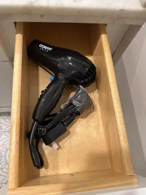 a black hair dryer in a wooden box at LRG 1600sqft 4room 2 bath in a quiet neighborhood in Bakersfield