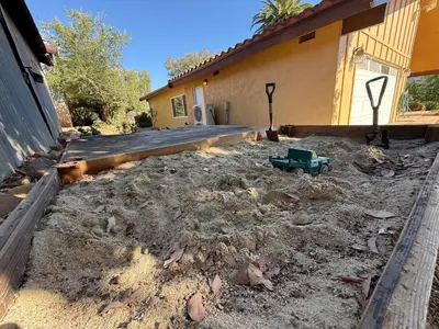 a house with a dirt yard in front of a house at Paradise at Tree Ranch Grove in Ojai