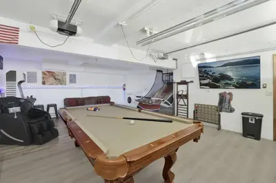 a room with a pool table in a room at Lakeview Pines Log Cabin - Custom Built Village Log Cabin Retreat w/ Hot Tub, Pool Table in Big Bear Lake