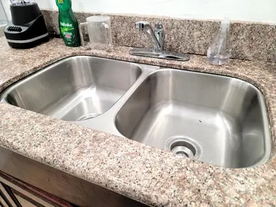 a stainless steel sink in a kitchen counter at Two bedroom private guesthouse in great location Close to Melrose Hollywood sign and attractions in Los Angeles