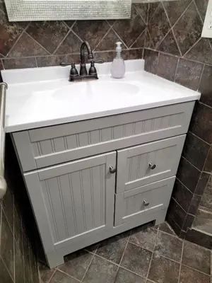 a bathroom vanity with a white sink at Two bedroom private guesthouse in great location Close to Melrose Hollywood sign and attractions in Los Angeles
