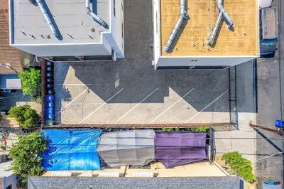 an overhead view of a building with a basketball court at Enjoy Stylish 4BR Townhouse Sleeps 8 with Wi-Fi in Los Angeles