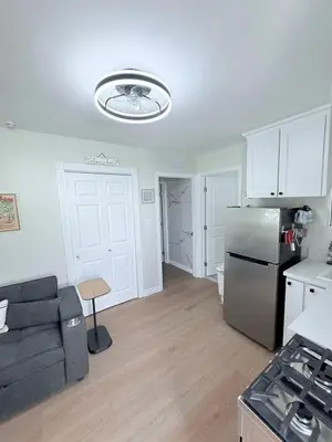 a living room with a refrigerator and a couch at Private 1BR 1BA Suite, Kitchen, Fireplace, Parking in Simi Valley