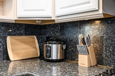 a kitchen counter with a toaster and a knife block at Spacious Family Retreat in San Dimas Great Location in Covina