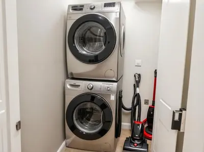 a washing machine and a dryer in a room at Stay in Style Hollywood Residences with Free Parking in Los Angeles