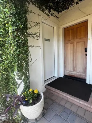 a front door of a house with a plant at Charming Cozy Studio 5 Minutes from Sofi Stadium in Los Angeles