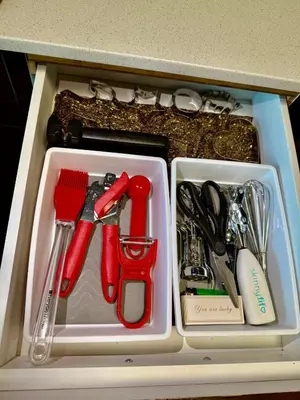 a drawer with utensils in a white container at Stylish Studio in Mid-Wilshire with Pool, Free Parking, Gym in Prime Location in Los Angeles