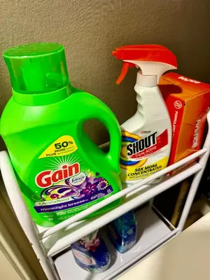 a shelf with a jug of detergent and a container of tooth paste at Stylish Studio in Mid-Wilshire with Pool, Free Parking, Gym in Prime Location in Los Angeles