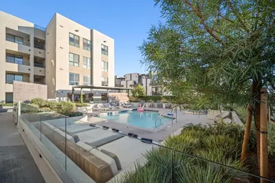 a swimming pool in the middle of a building at The Jade Hill Views - Penthouse - Pool, Gym, Balcony in Los Angeles