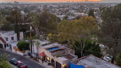 an aerial view of a house in a city at Spanish Revival Charm in Silver Lake w Patio BBQ Walkable Location Maltman Manor by AvantStay in Los Angeles