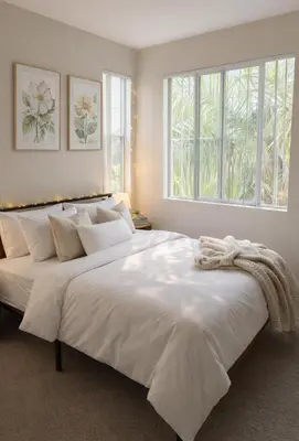 a large white bed in a bedroom with a window at Relaxed Marina del Rey Stay - 1BR with Pool, Sauna & Gym Access in Los Angeles