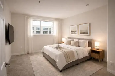 a bedroom with a large bed and a window at Marina Del Rey Apartment with Resort Amenities - Short Distance To Venice Beach in Los Angeles