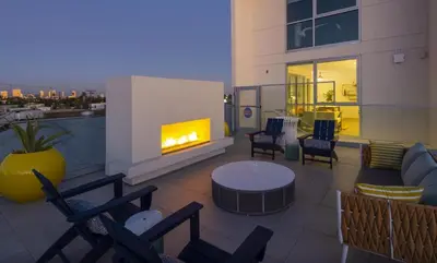 a balcony with a fireplace on a building at Santa Monica 3BD Serenity Suite with FREE PARKING in Los Angeles