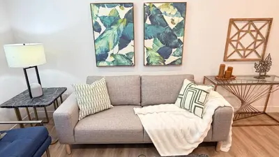 a living room with a couch and a table at Modern Luxury House 3B&4B House 30 mins DTLA in Baldwin Park