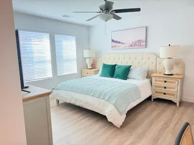 a bedroom with a bed and a ceiling fan at Modern Luxury House 3B&4B House 30 mins DTLA in Baldwin Park