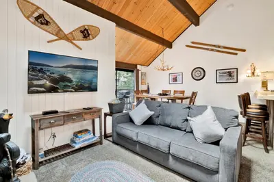 a living room with a couch and a table at Switzerland Summit Condo #2569 in Big Bear Lake