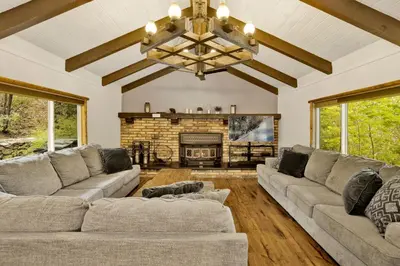 a living room with two couches and a fireplace at Arlberg Village Haus #2571 in Big Bear Lake