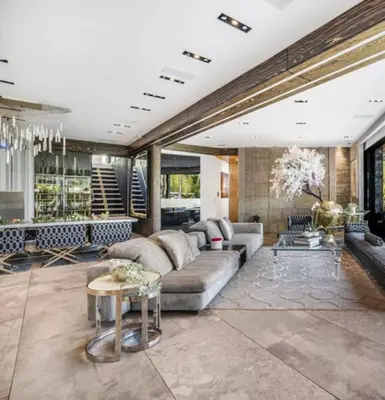 a living room with a couch and a table at Bali Inspired Villa in Sunset Plaza in Los Angeles